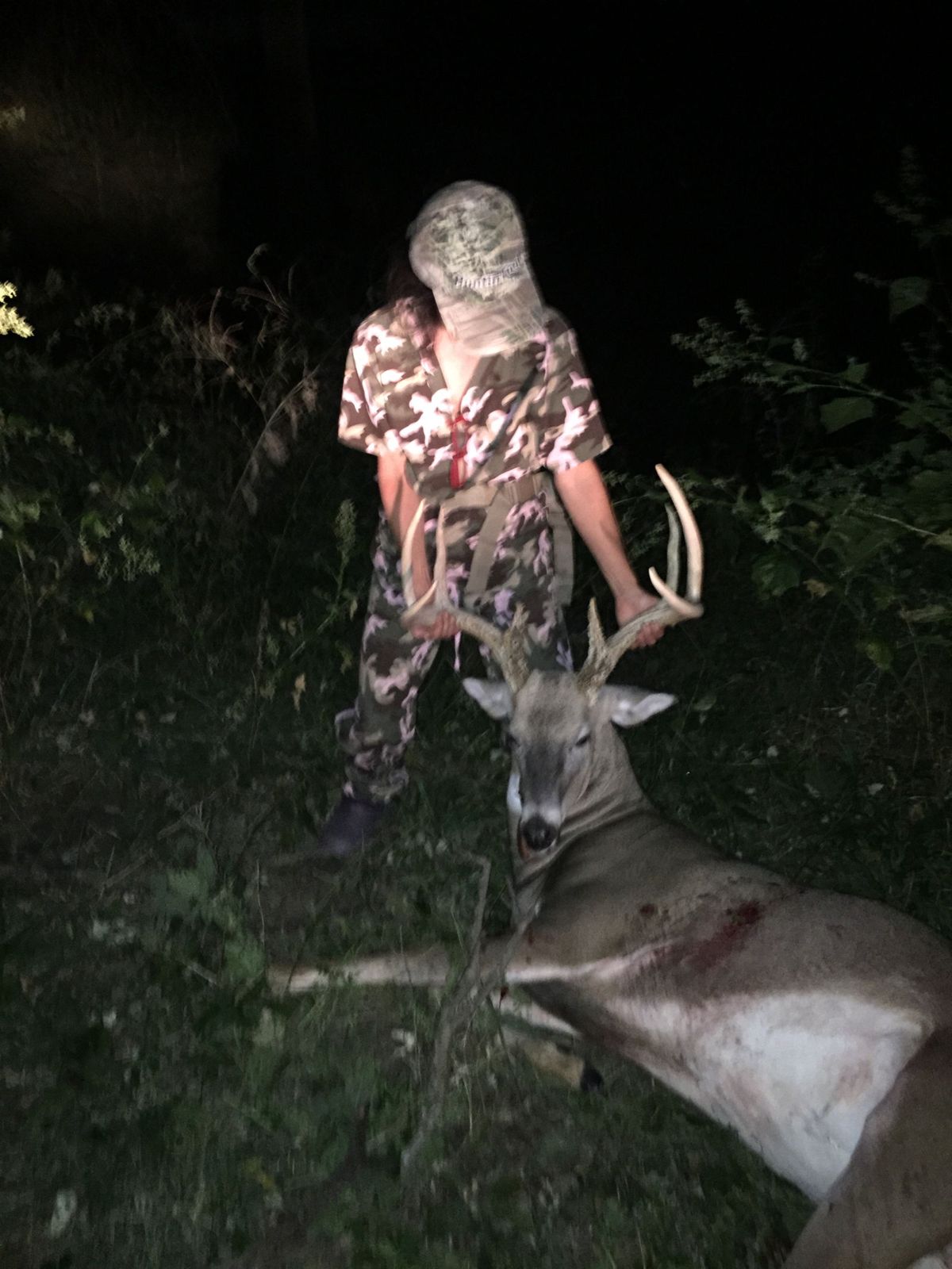 Young hunter with a first whitetail
